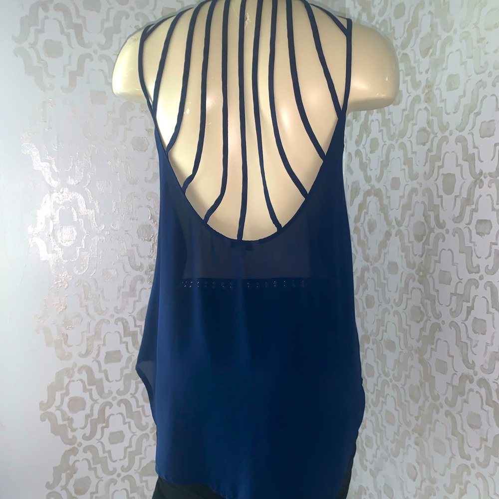 Naked Zebra blouse with a darling cut out back sz Small.. ENC